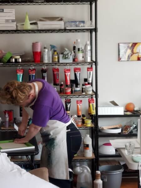 Terri Ng hard at play in the painting studio